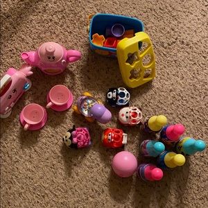 Various toddler toys. Tea set shapes cars bowling.